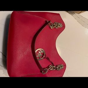 Red ladies Michael Kors handbag